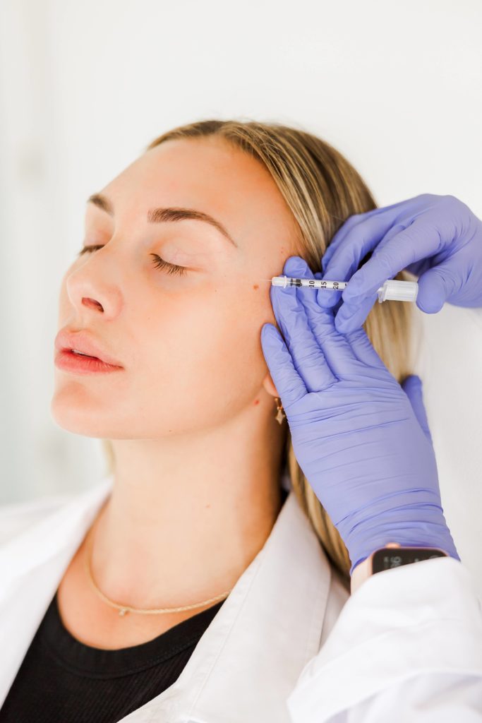 Young Woman Getting Botox Injection | The Shine Spa in Clayton, MO