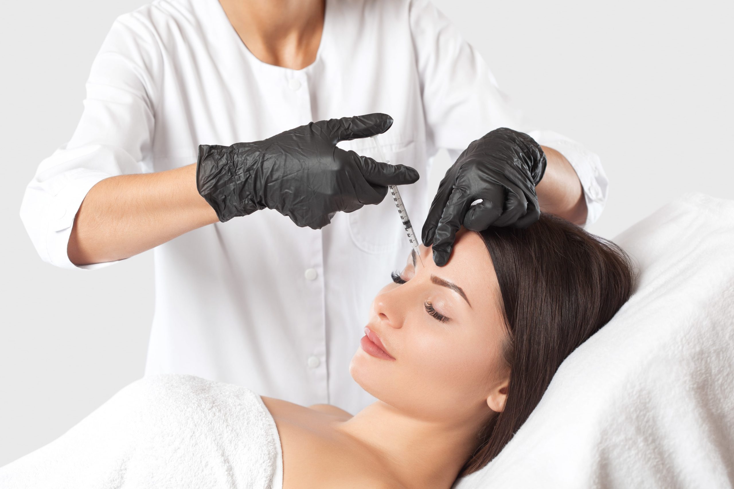 Young Woman Taking Botox Injection on the Face | The Shine Spa in Clayton, MO