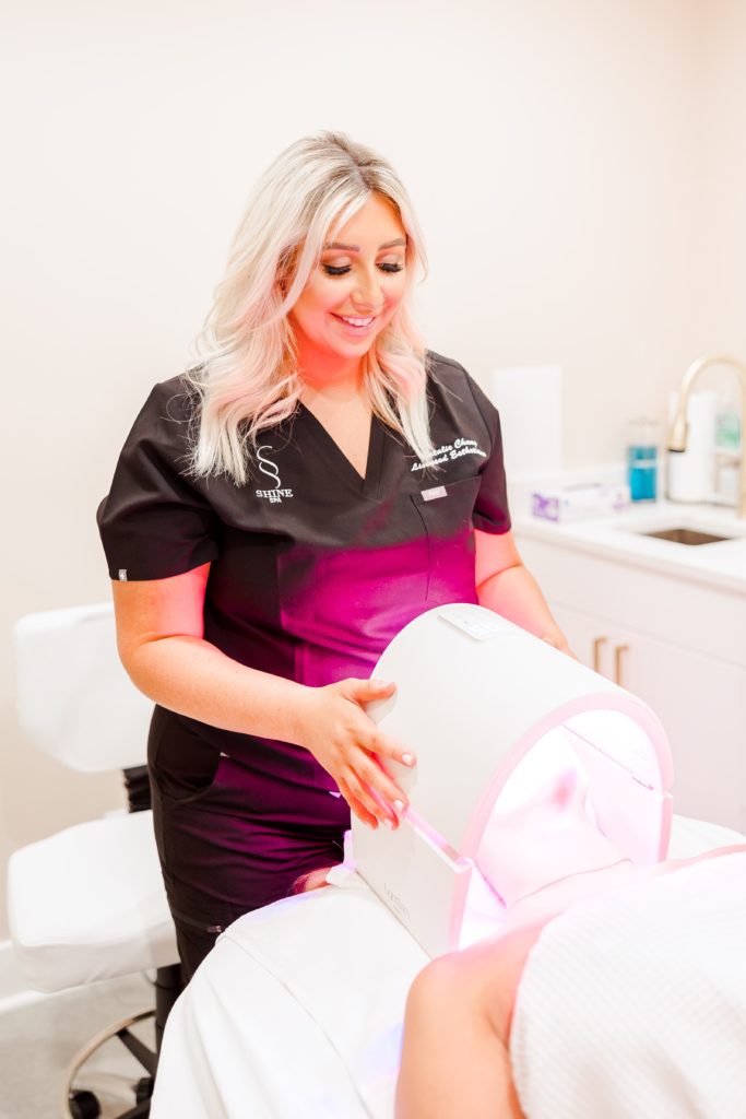 Esthetician Doing LED Therapy | The Shine Spa in Clayton, MO